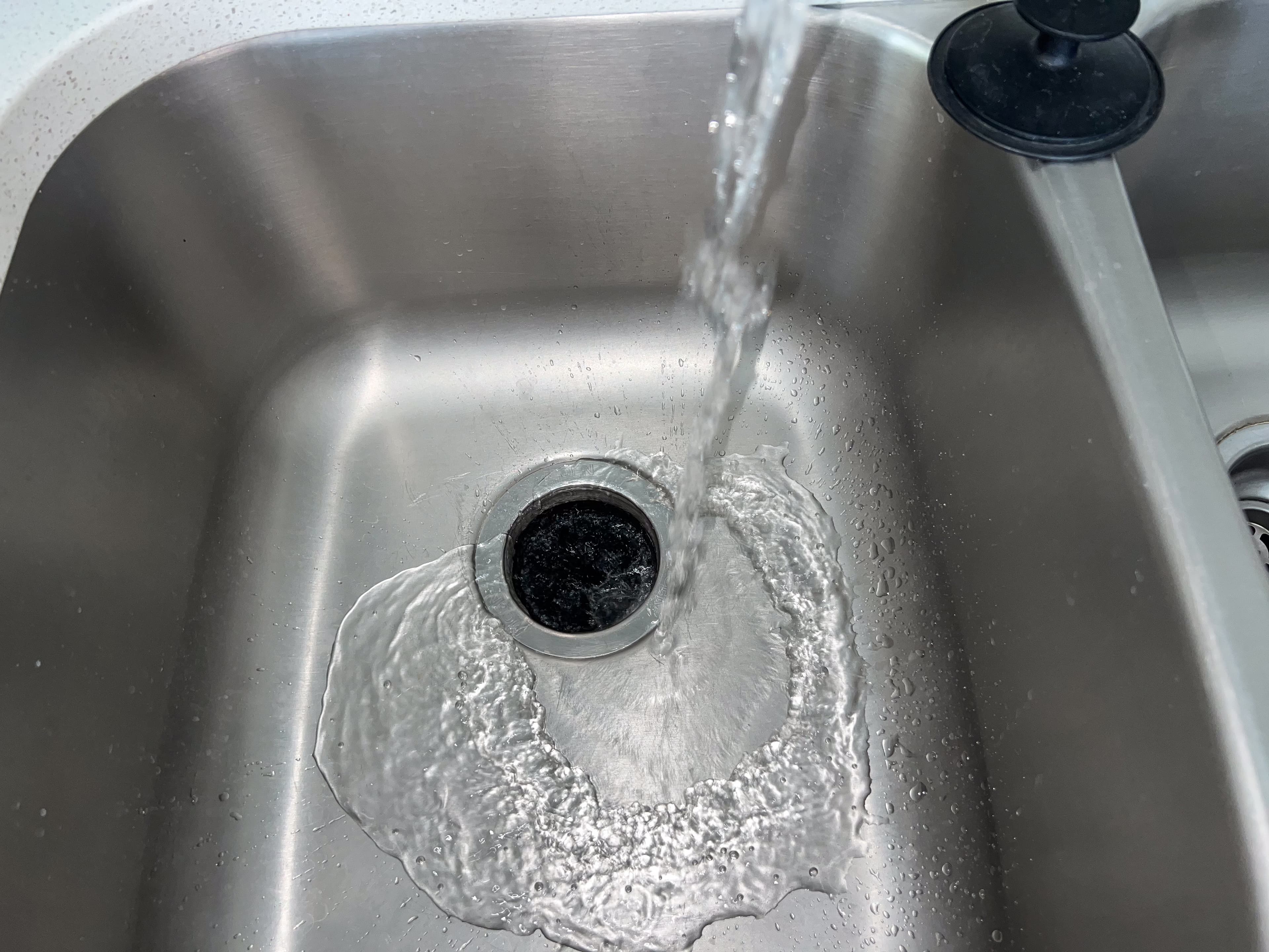Plumbing professional at work